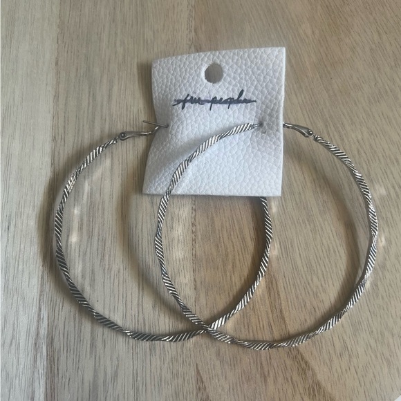 NEW Free People Silver Twisted Hoop Earrings✨ - Picture 3 of 7
